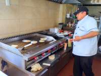 Watch The Staff Cook Your Meals Here at Islander!